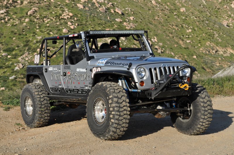 JKOH Jeep build posed on rocks