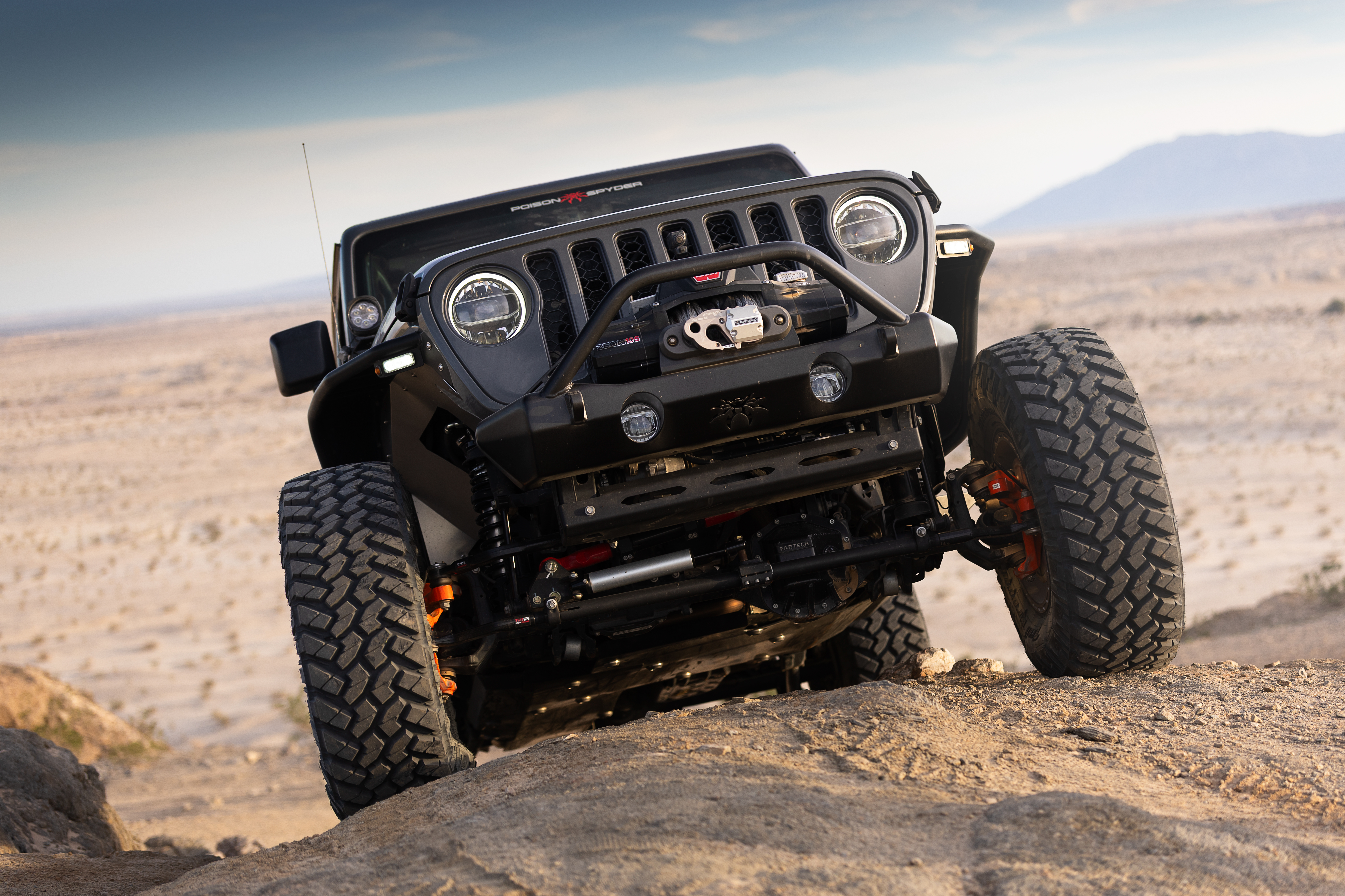Poison Spyder Nightshade JL Wrangler with black Crawler bumpers and Bruiser skid plate