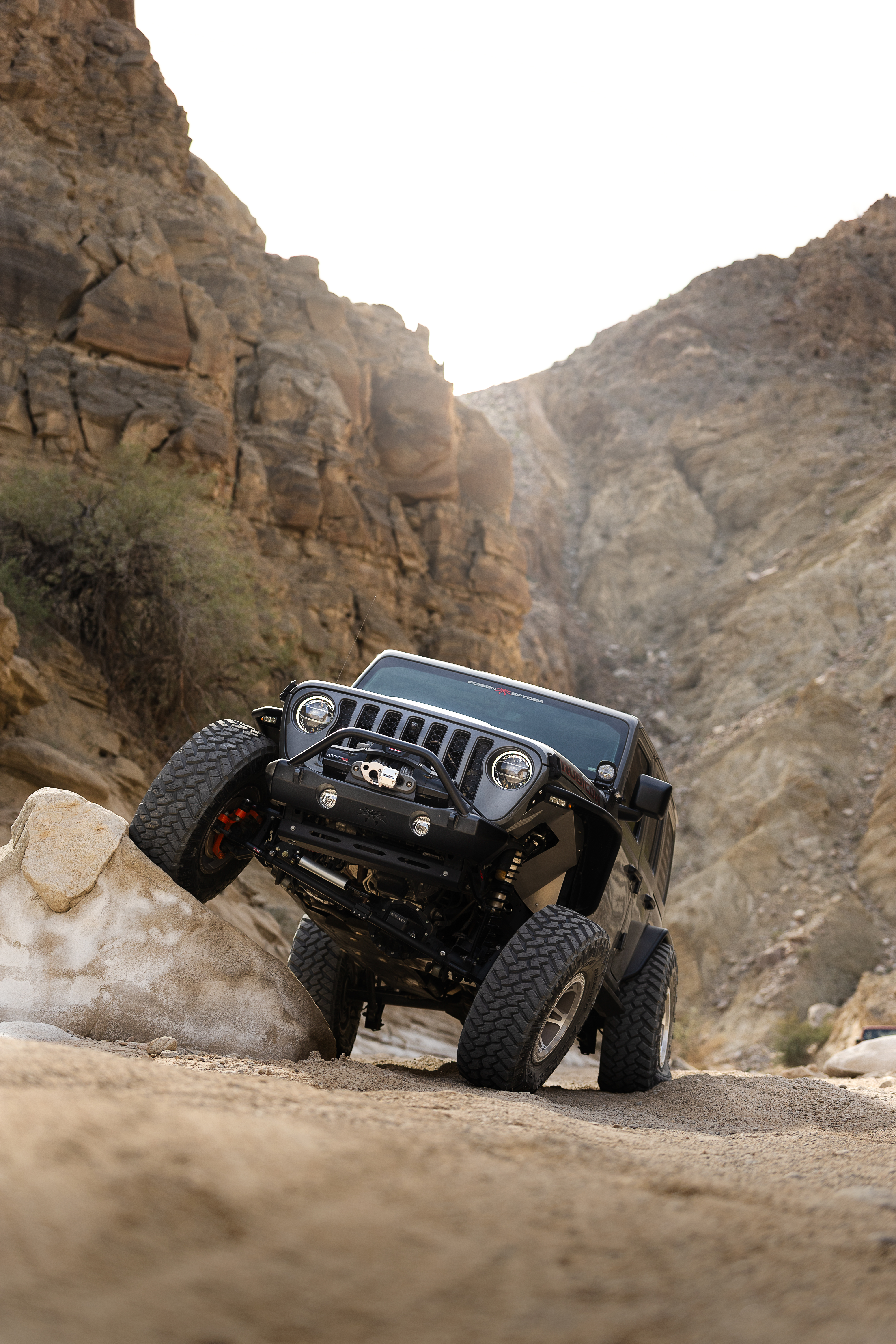Poison Spyder Nightshade JL Wrangler Unlimited Rubicon side profile on a desert trail