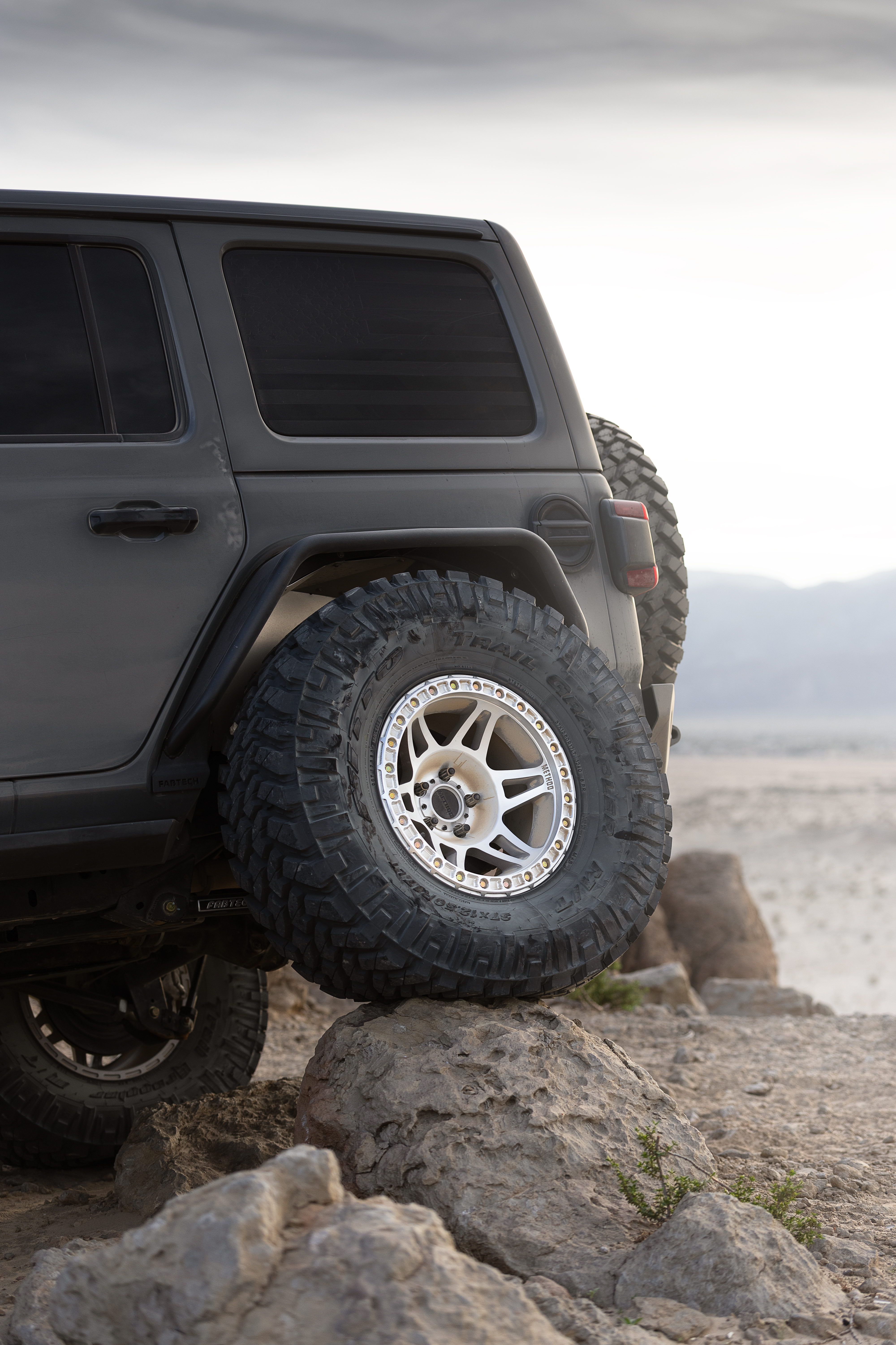 Poison Spyder Nightshade JL Wrangler Rubicon on a rocky off-road trail