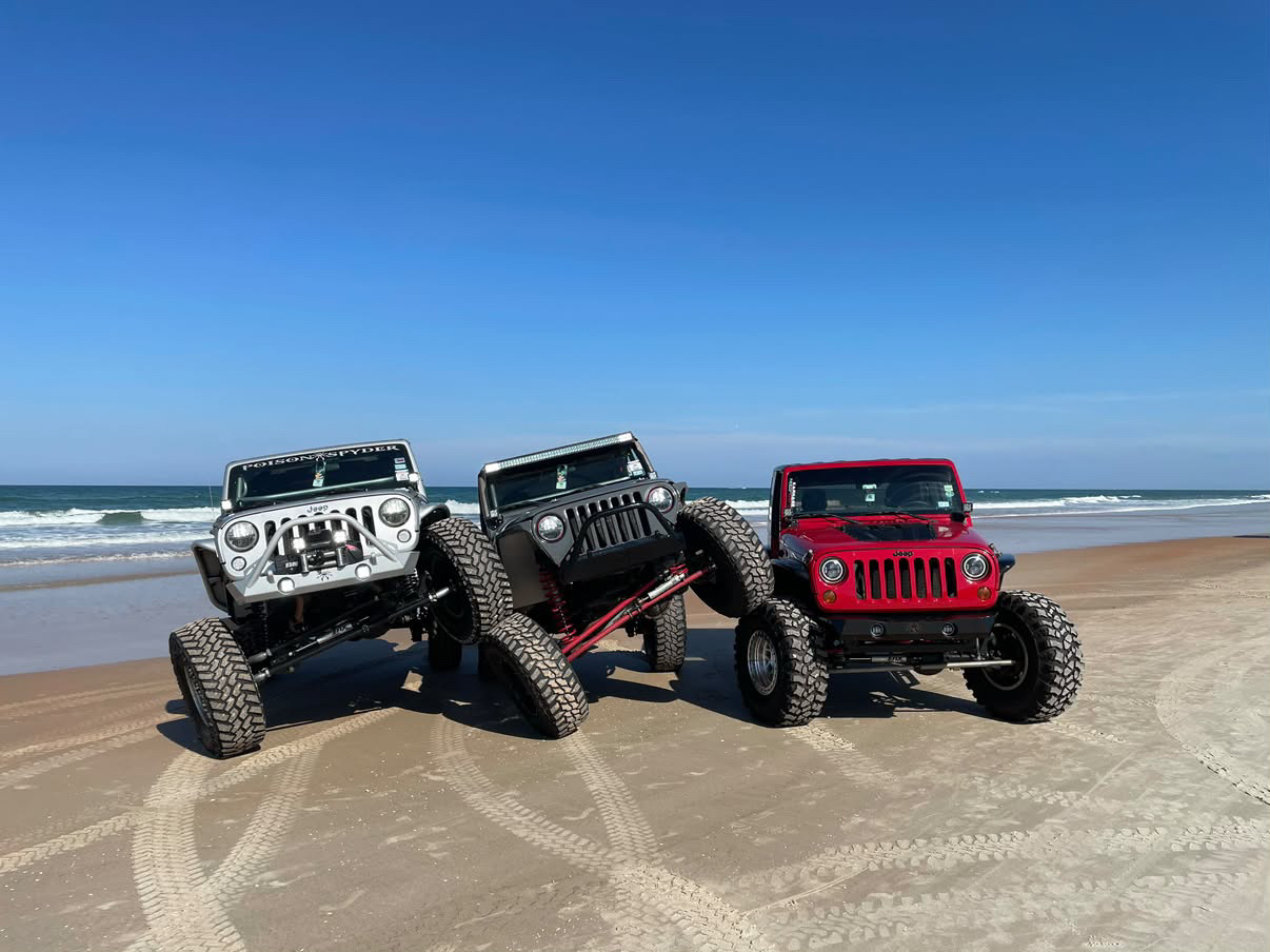 Poison Spyder Platinum Jeep Wrangler Unlimited Sport climbing rock with Brawler-Lite bumper and Crusher flares