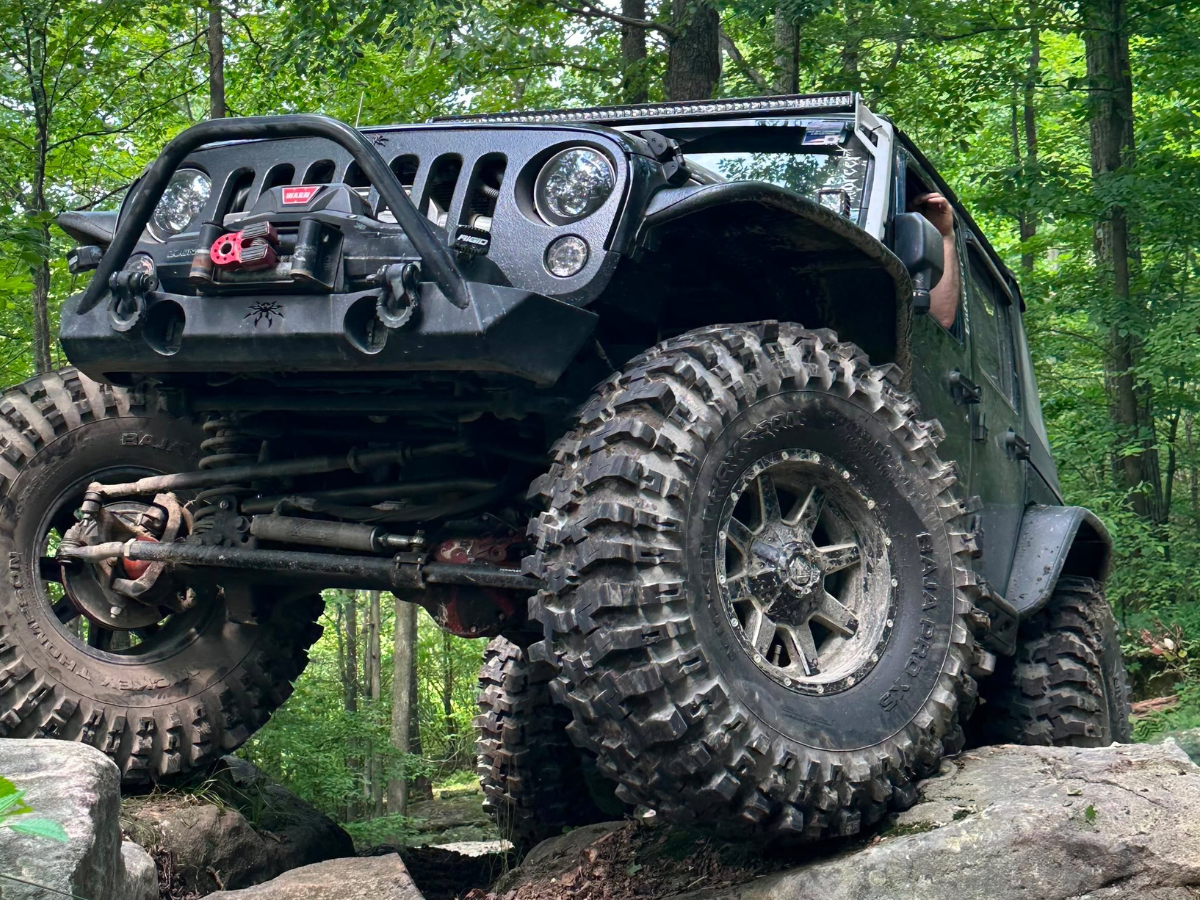 Jeep Wrangler JK front end on the trail showing Rock Krawler suspension and Fox shocks